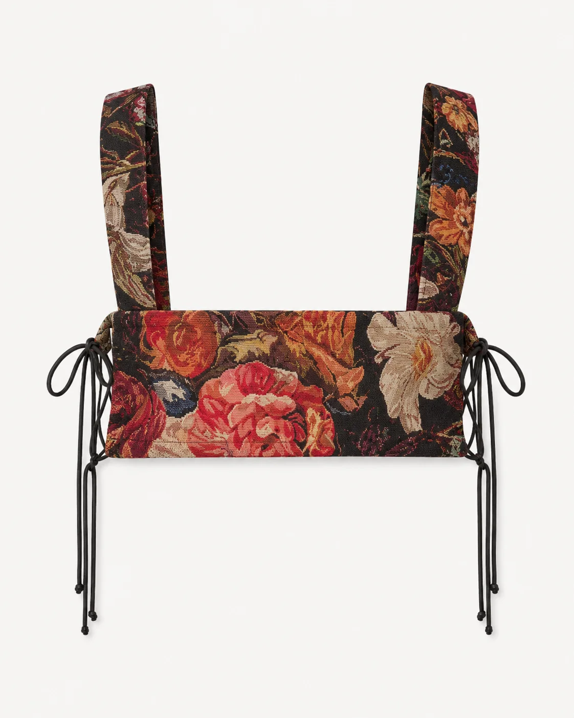 Back view of multicolour woven harness bib showing floral textile, shoulder straps and adjustable side ties.