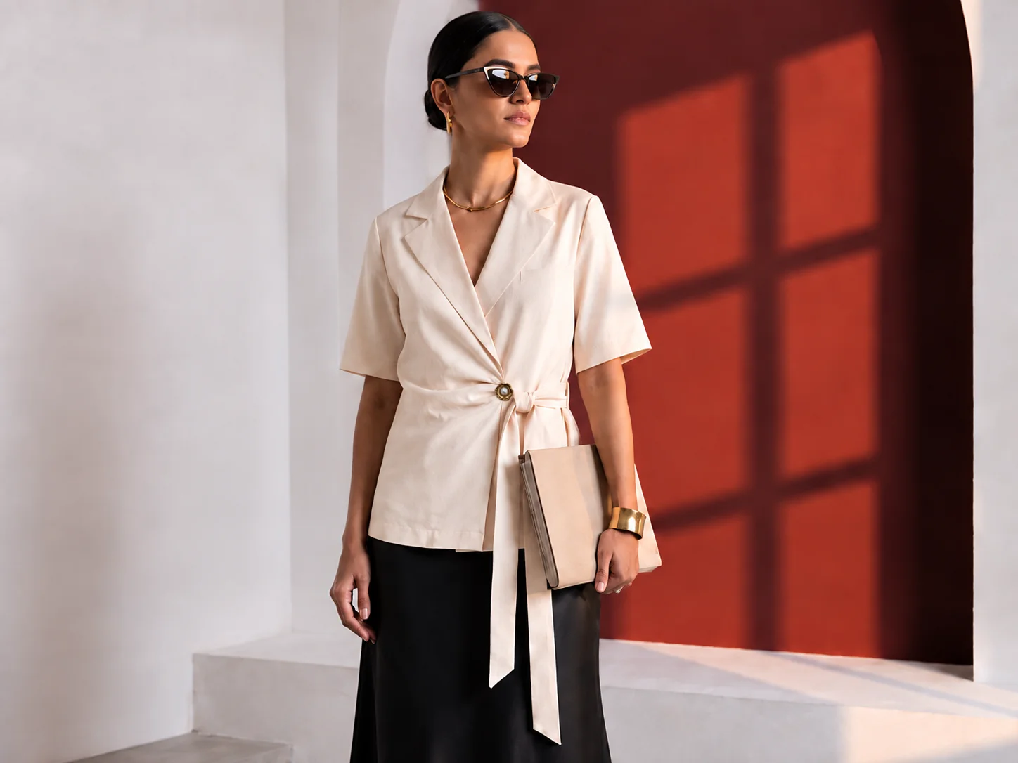 Cream Final Draft short-sleeve blazer with self-tie waist shown from the front.